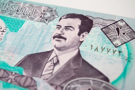 iraqi money with saddam image