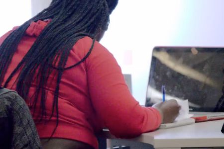 woman studying at computer